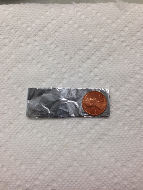 Penny on Aluminum