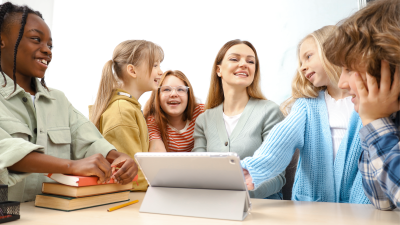 Students gathered around their teacher